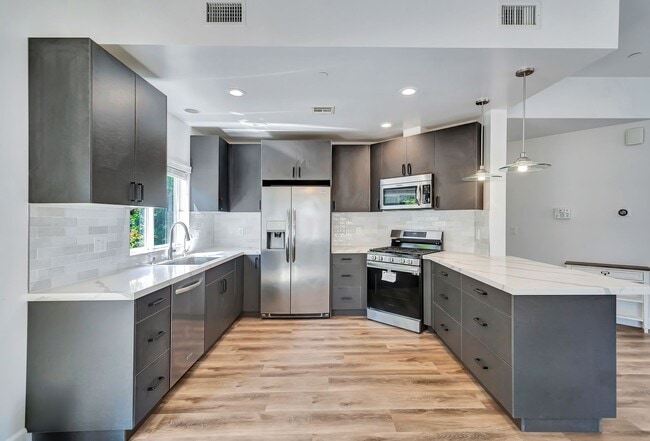 Building Photo - Modern 4-Bedroom Home in Prime West LA | Walkable, Spacious & Move-In Ready