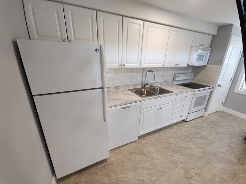 Modern and Spacious Kitchen - Cypress Bend Village Apartments
