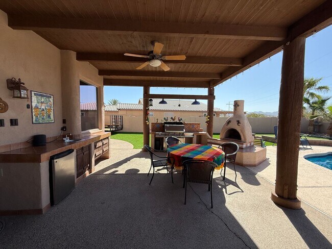 Building Photo - Gorgeous Furnished Pool/Spa Home with spectacular views
