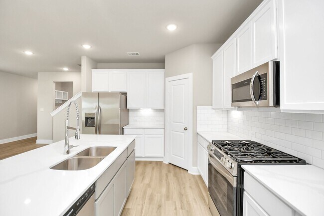 Building Photo - Welcome to the Sage — Spacious Style, Effortless Elegance.