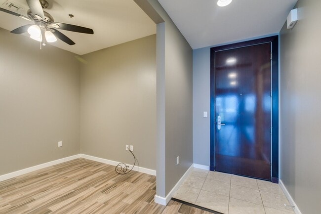 Building Photo - Iconic Strip-View Luxury | Elegant 1BR + Den High-Rise Residence