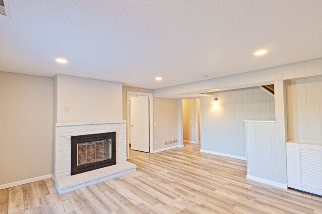 Building Photo - Spacious 3-Bedroom Attached Villa with Finished Basement & Private Fenced Yard!
