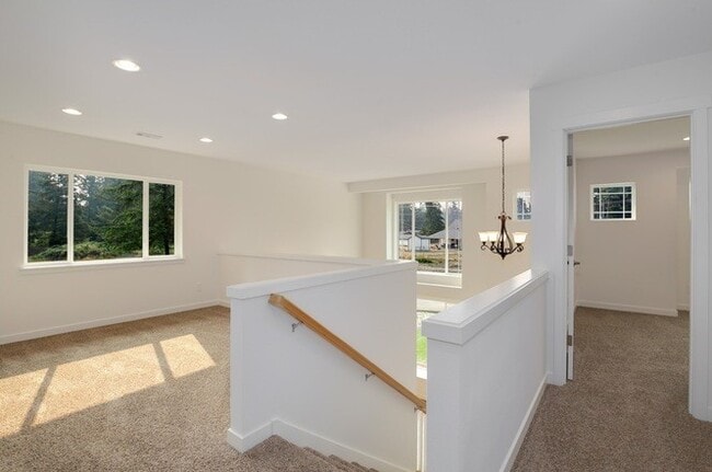 Building Photo - Modern Luxury: Spacious 3-Bedroom Home Near JBLM