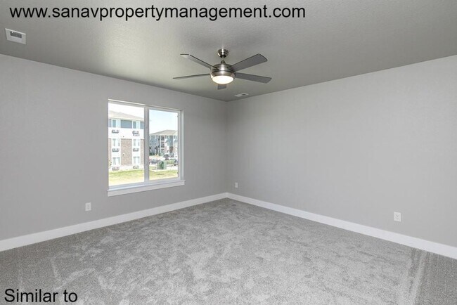 Building Photo - Stunning 4-Bedroom Home with Finished Base...