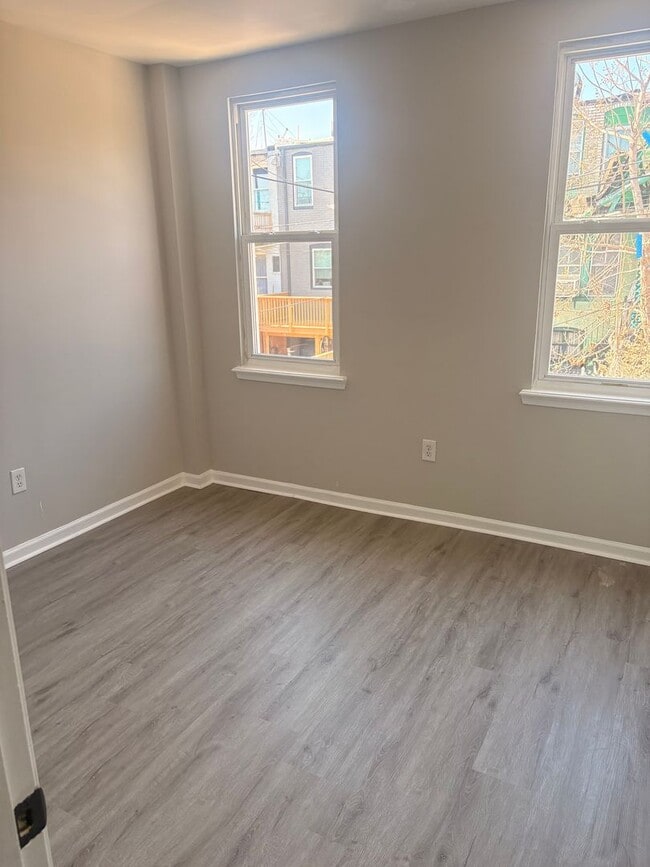 Building Photo - Charming Baltimore Rowhome Near Johns Hopkins – Bright & Move-In Ready