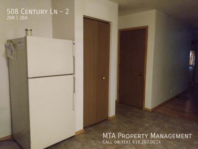 Building Photo - Two Bedroom 1.5 bath unit for rent