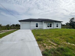 Building Photo - NEW CONSTRUCTION- Modern 3 Bed / 2 Bath Home in Lehigh Acres