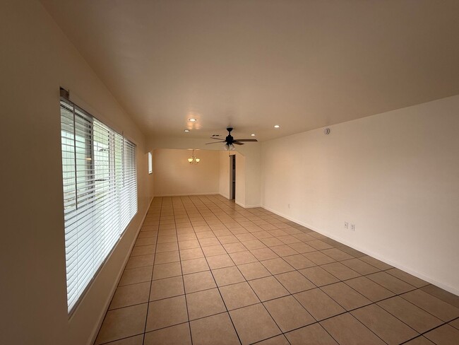 Building Photo - 4 Bedroom Home with Large Backyard | Modern Landscaping | Utilities Included