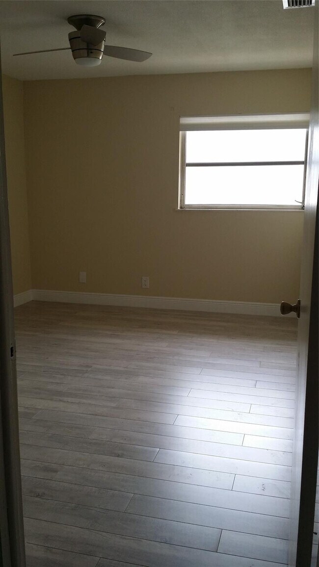 Building Photo - 8877 NW 28th Dr