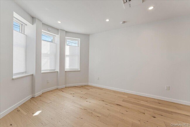 Building Photo - 36-34-36-11 11th St