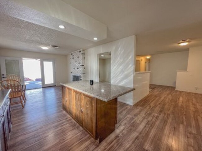 Building Photo - Spacious 4-Bedroom Home with Modern Upgrad...