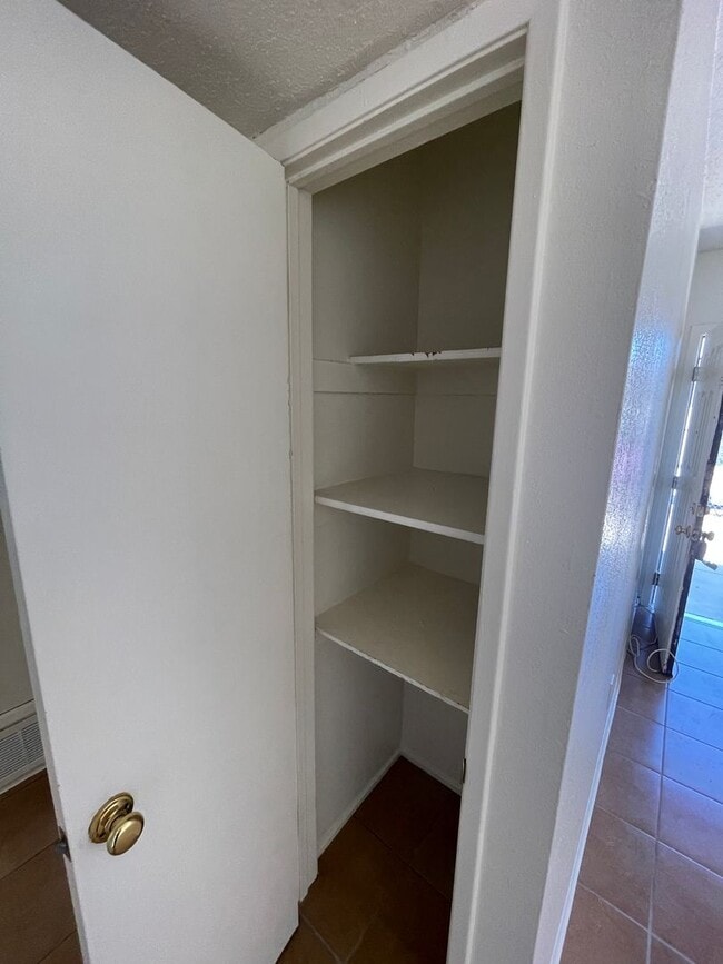Building Photo - Two Bedroom With A/C, Fenced Yard and Wash...