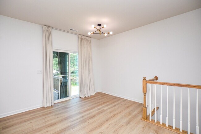 Building Photo - 3 Bedrooms | 2.5 Bathrooms | Lower-Level Flex Room | Approximately 1,978 Square Feet | 2-Car Gara...