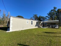 Building Photo - Remodeled 4 Bedroom, 2 Bathroom Manufactur...