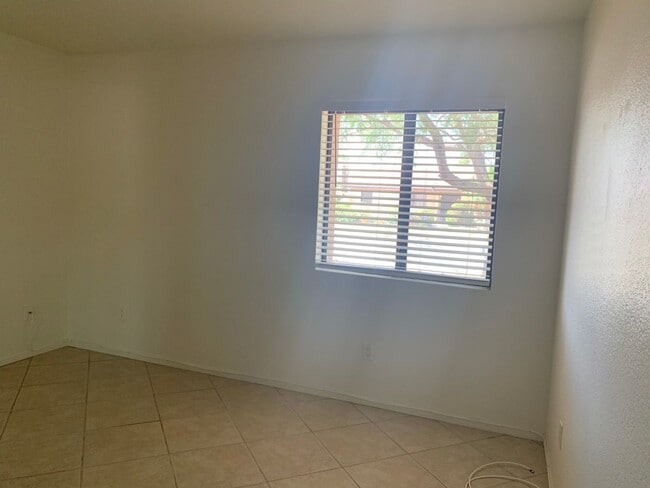 Building Photo - Four Bedroom Home with Utilities included!