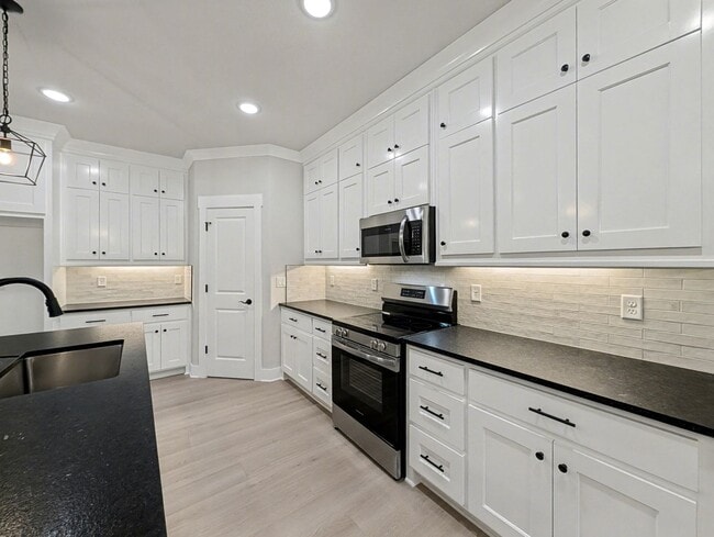 Building Photo - Fabulous New Construction Rental in Bella Vista Featuring a Rare 3-Car Garage