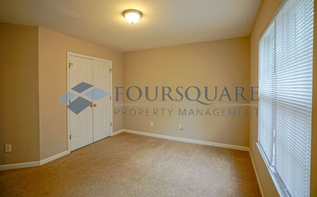 Building Photo - Townhome | 2nd Bedroom Features an En-Suit...