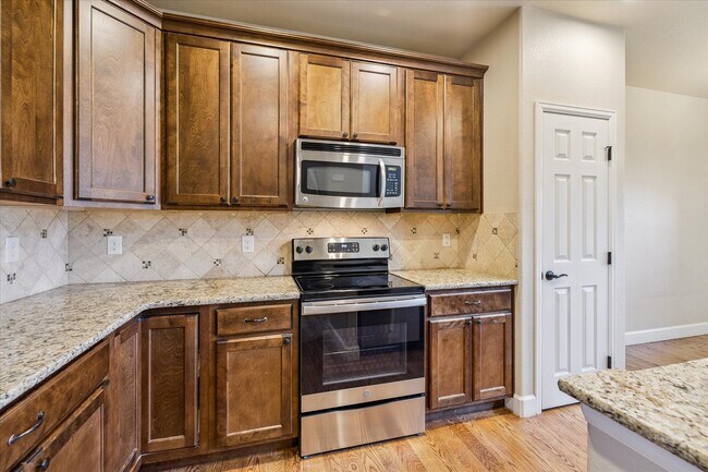 Building Photo - 9793 W Hinsdale Ln