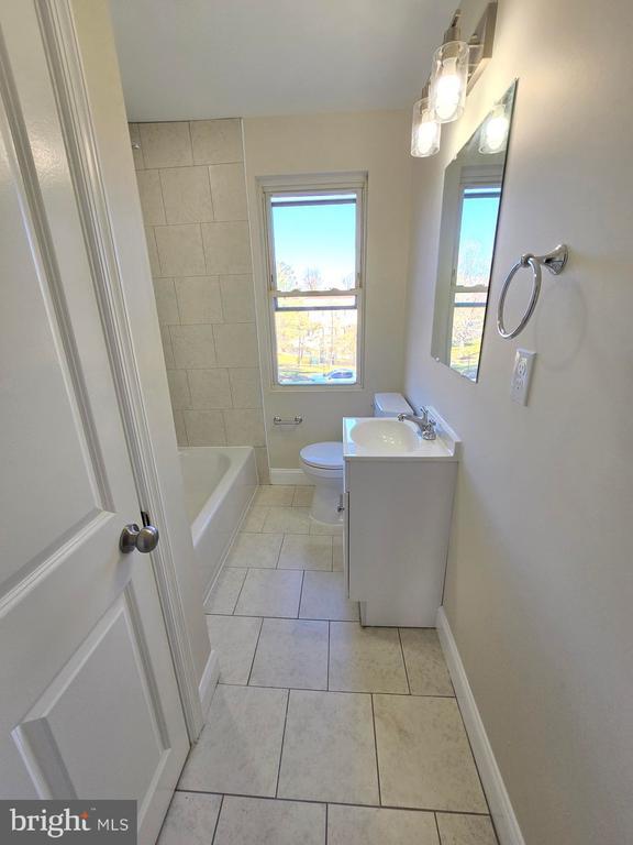 Building Photo - 3838 Greenspring Ave