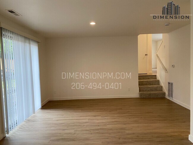 Building Photo - Stylishly Renovated Home with Private Back...