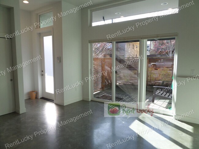 Building Photo - Spectacular VIEW 2 Bedroom+Den Townhome, Zoned For Residential & Commercial Use! Live and Work in...