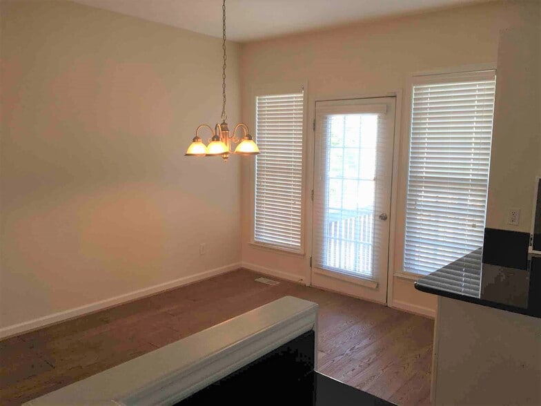 Dining room leads to back deck. - 7042 Mead Lane