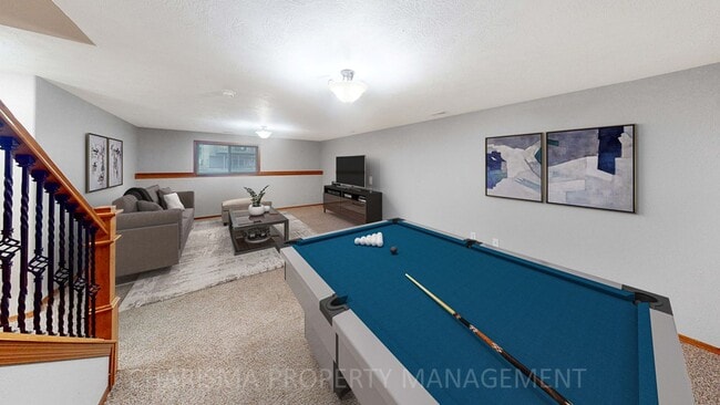 Building Photo - 3 BD, 2.5 BA TOWNHOME, DOUBLE ATTACHED GARAGE, PET FRIENDLY, WALK OUT DECK, LOTS OF SPACE!
