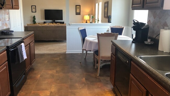 Large open concept kitchen and eating area with living area and TV in line of site! - 603 Avondale Rd