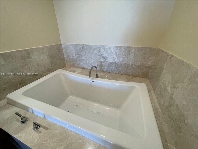 Building Photo - 17001 Collins Ave