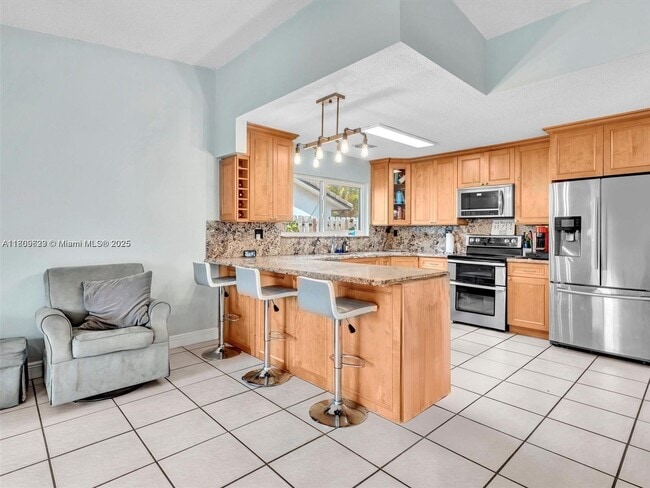 Building Photo - 11310 SW 58th Ct