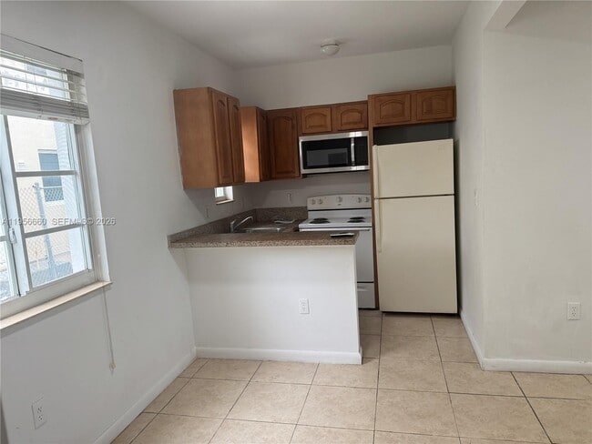 Building Photo - 7130 Rue Versailles Dr