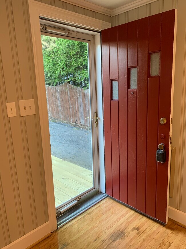 Den door opens to back deck/yard - 166 Montague St