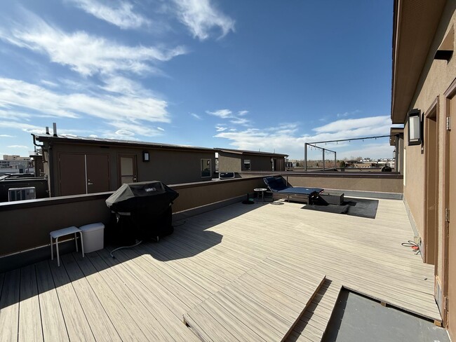 Building Photo - Modern Townhouse with Rooftop Deck & Mountain Views Near Sloan’s Lake!!