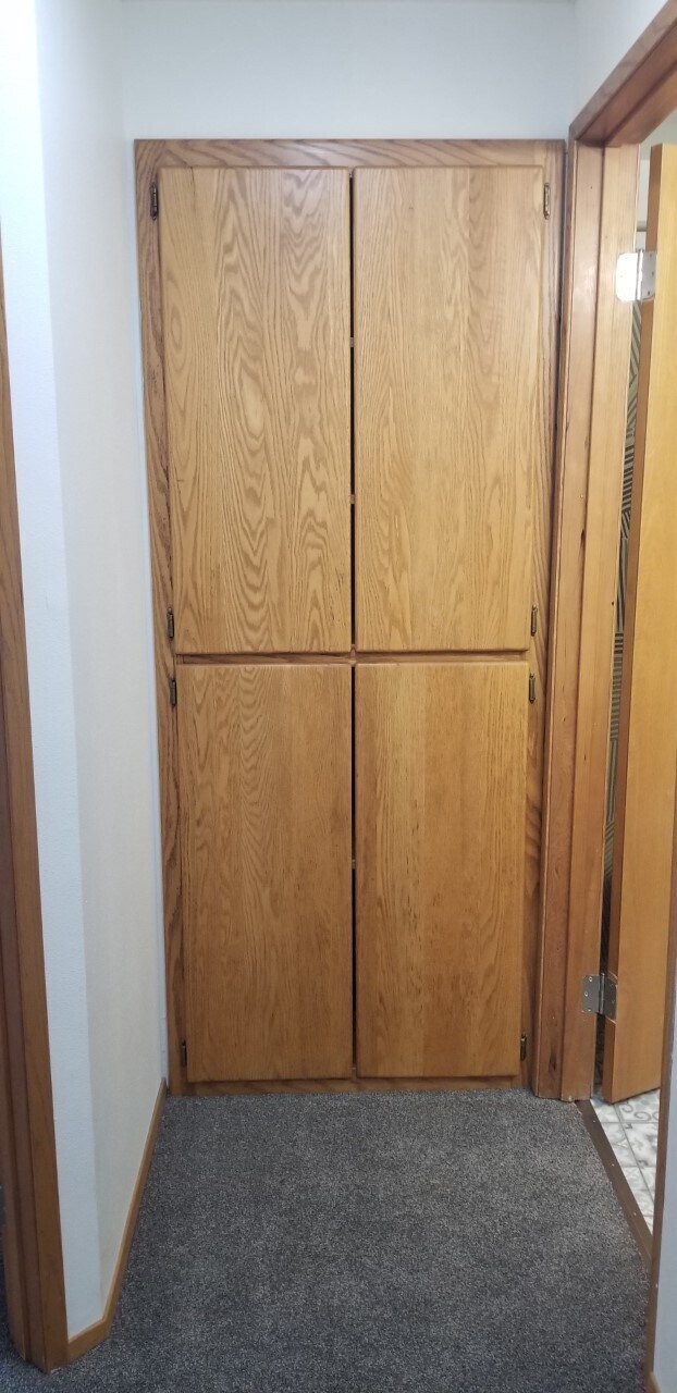 Linen closet in upstairs hall - 10615 Hillsboro Dr NW