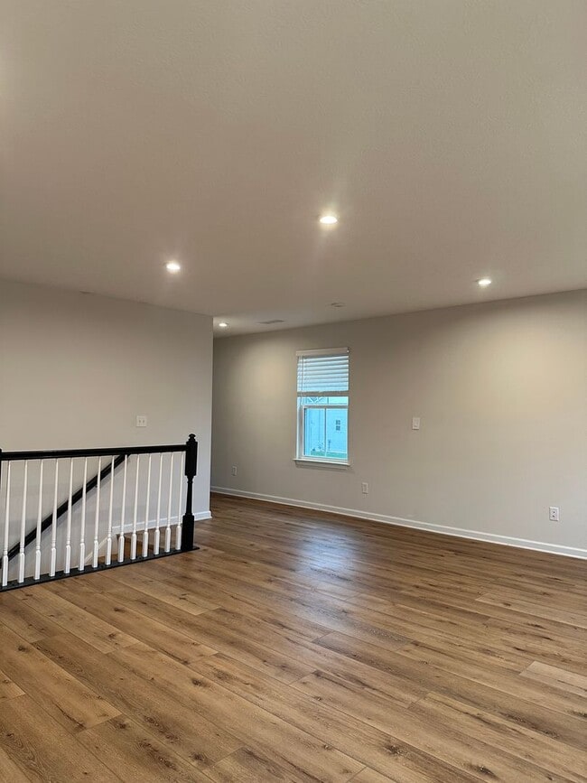 Building Photo - Welcome to this stunning 4-bedroom, 2.5-ba...