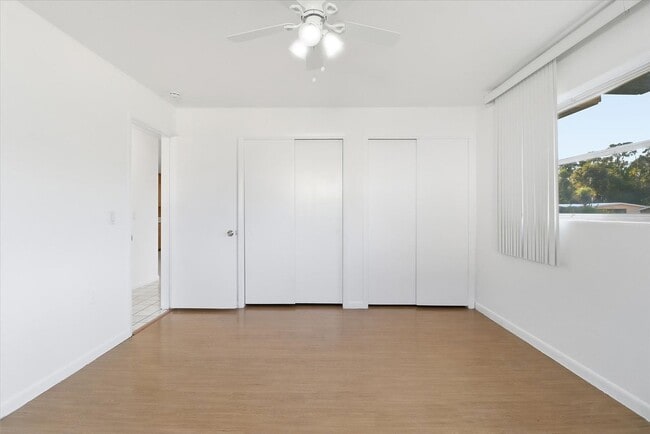 Building Photo - Charming  Florida 2 Bedroom Bungalow with an Additional Bonus/Sunroom, Covered Parking & Patio