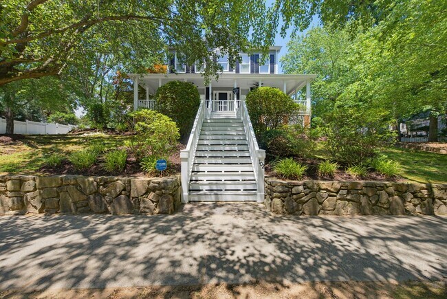 Building Photo - Southern Charm Meets Everyday Entertainment and Convenience!