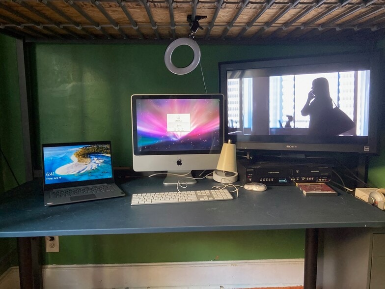 $700 middle room desk, hardwired internet and selection of computers and television. - 209 Park Ter