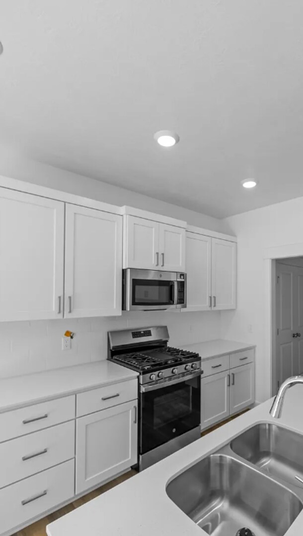 Building Photo - Newly Built 4 Bedroom Townhome!