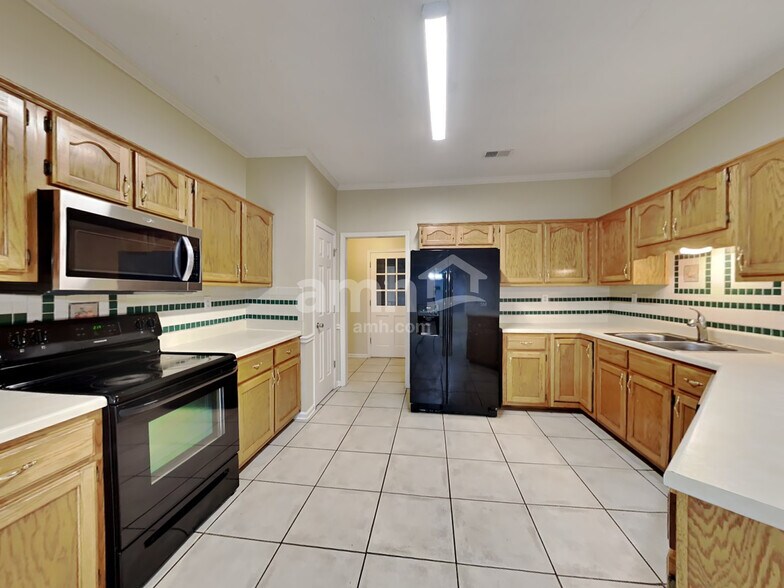 Building Photo - 2713 Country Glade Cv N