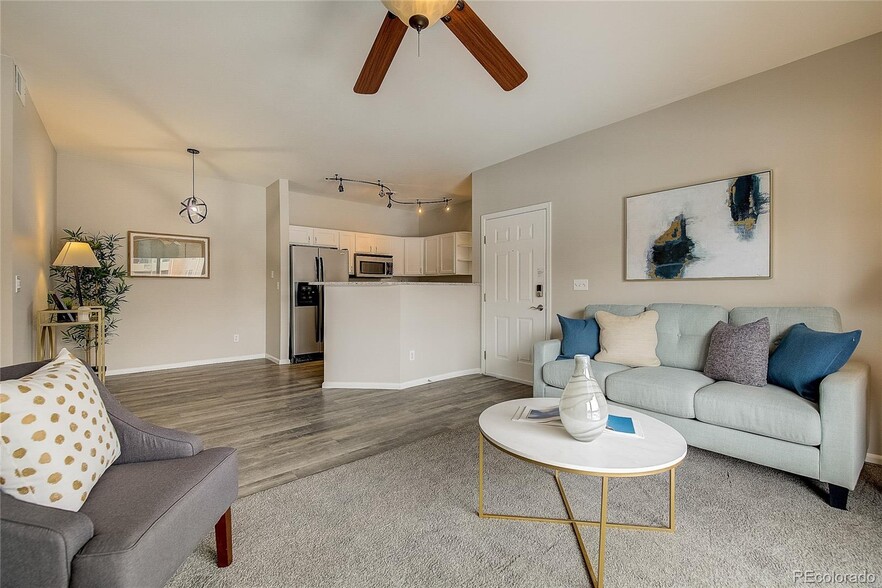 Open concept with room for table! - 10784 W 63rd Pl