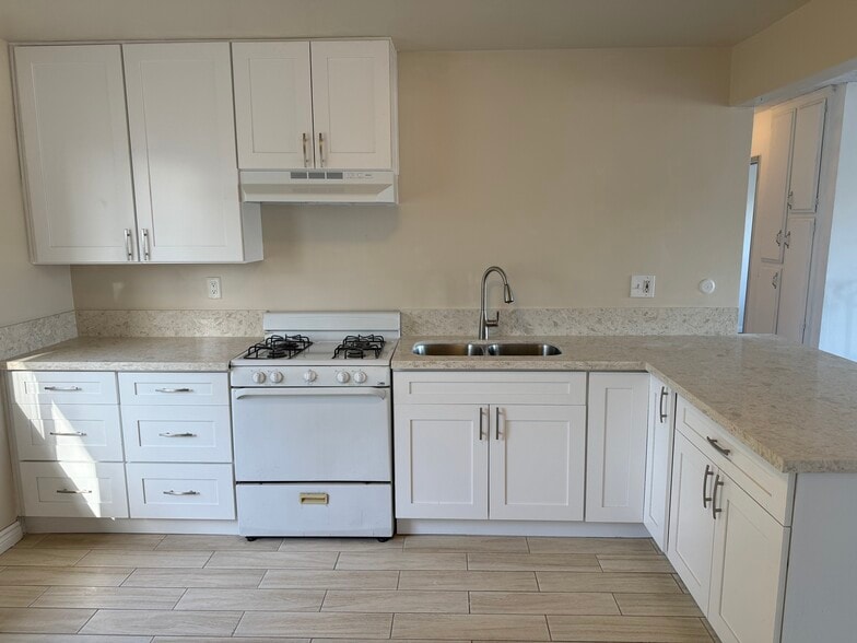 Kitchen w/new cabinets - 4215 11th St