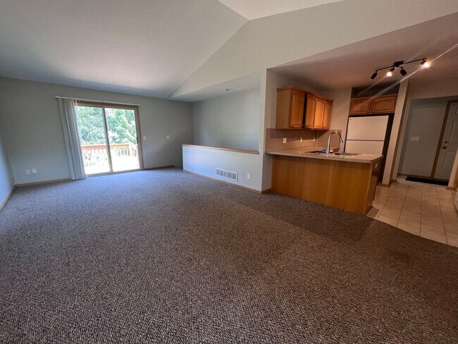 Building Photo - Spacious Duplex in Walker! Two Stall Garage!