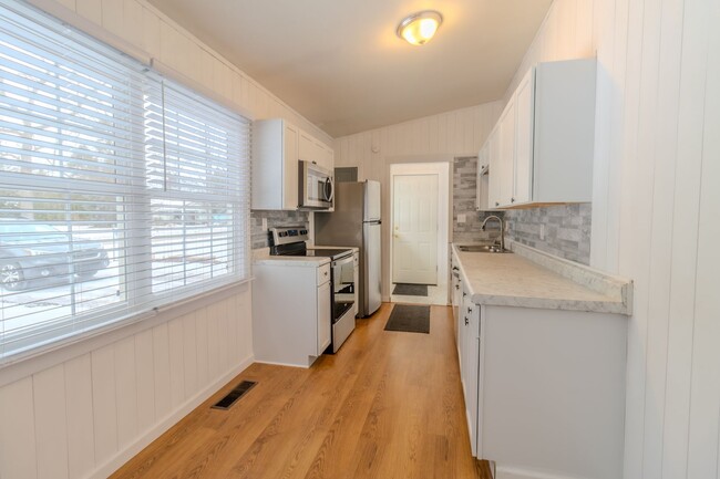 Building Photo - Price Drop!! Cute & Cozy 2-Bedroom Home Ne...