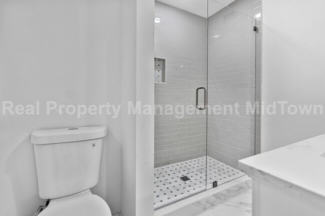 Building Photo - Live Elevated in the Heart of Viridian – S...