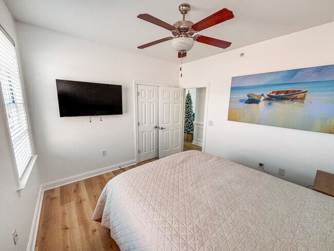 Building Photo - Fully Furnished Waterfront Elegance on Mai...
