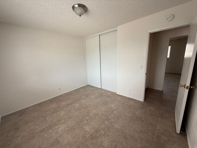 Building Photo - Victorville - 3 Bedrooms, 2 Bathrooms, New Paint, New Blinds, Tile Floors
