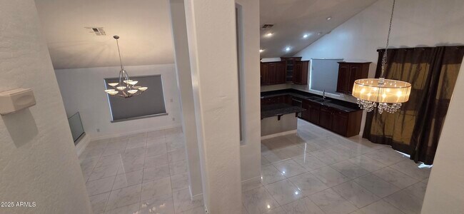 Building Photo - 9418 S 46th Dr