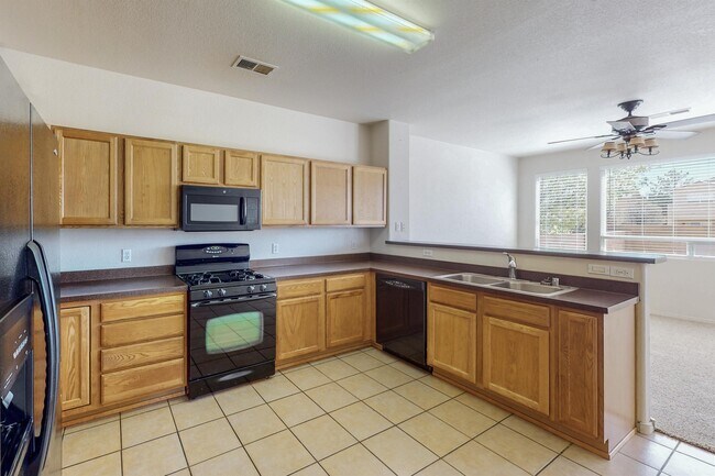 Building Photo - 6512 Los Pueblos Pl NW