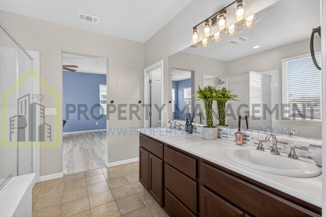 Building Photo - Spacious Elegance Awaits: 4-Bedroom Home with Hardwood Floors in Elk Grove!